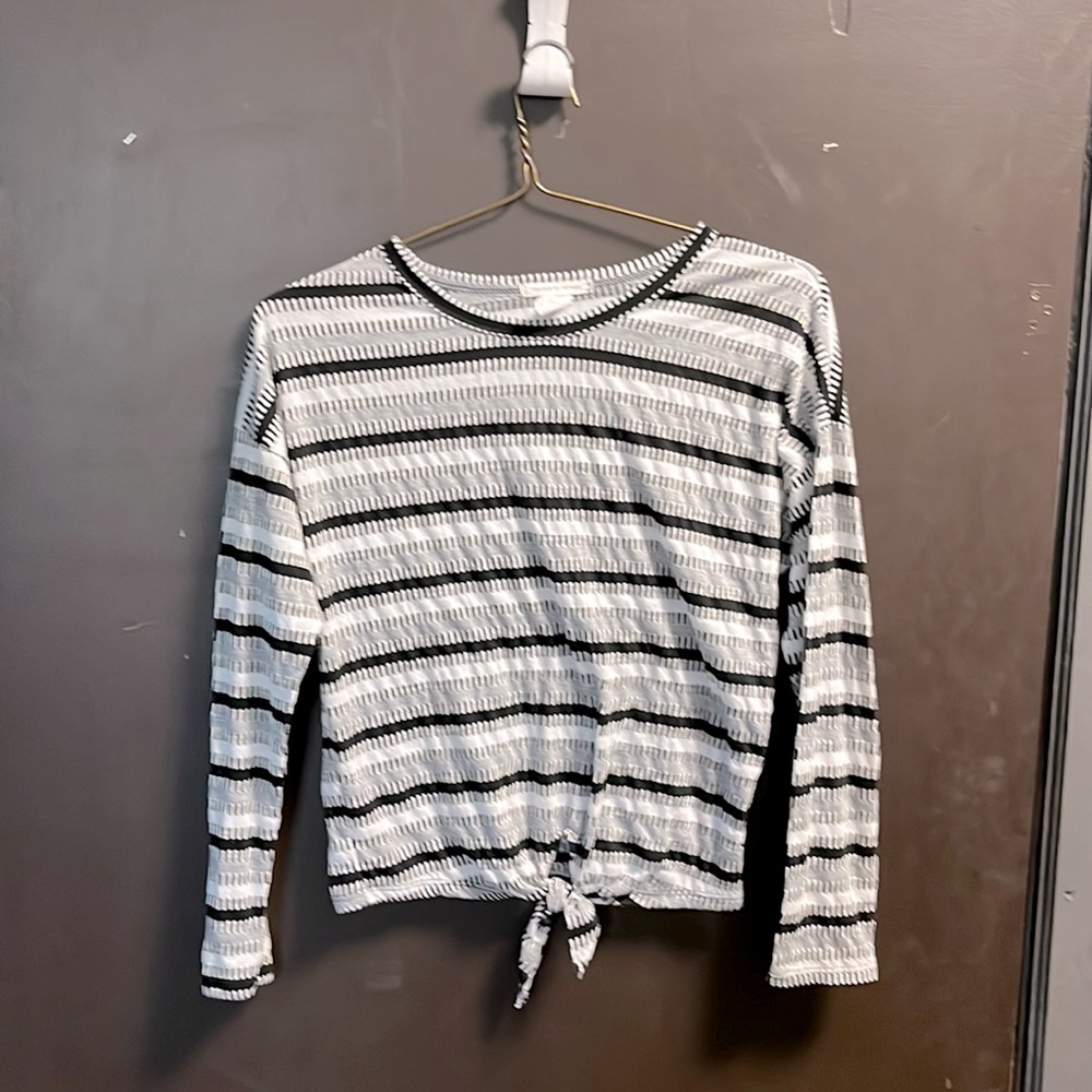 Woman's medium CAUTION TO THE WIND long sleeve tee shirt.